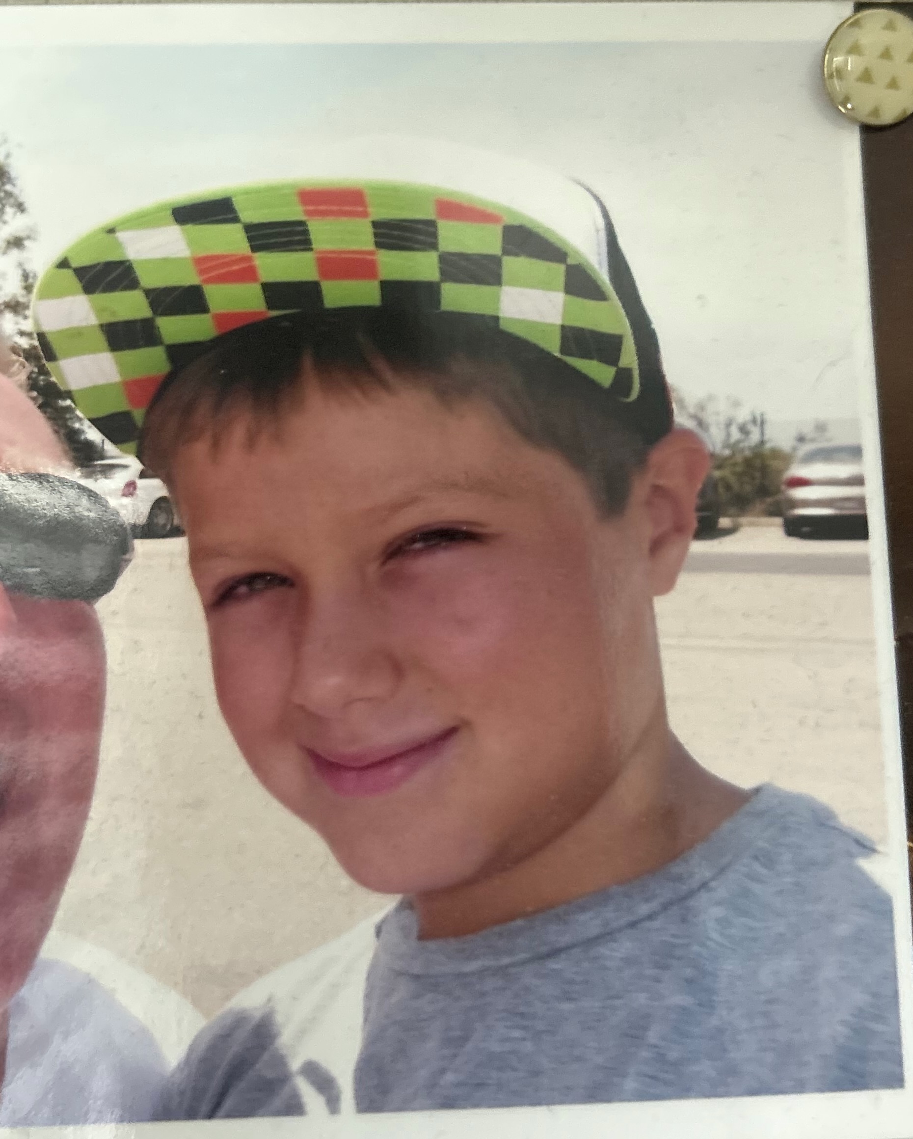 low quality picture of a young boy